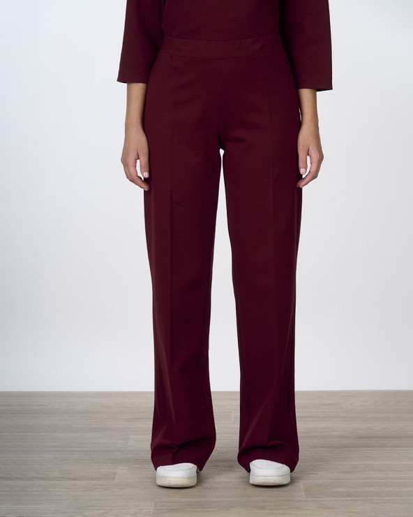 Pantaloni palazzo bordeaux...