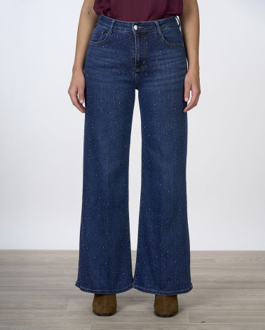 Jeans wide leg con strass all over