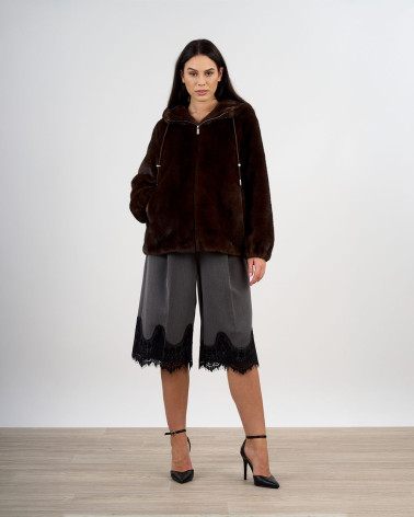 Giacca in eco pelliccia con cappuccio e zip
