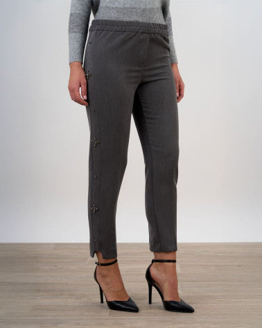 Pantaloni grigi con applicazioni gioiello laterali
