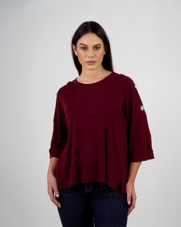 Maglia ampia con bottoni...