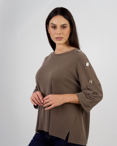 Maglia ampia con bottoni decorativi sulle maniche